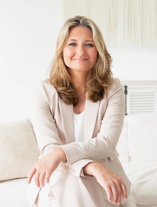 Brandy Gillmore seated, portrait from her official website